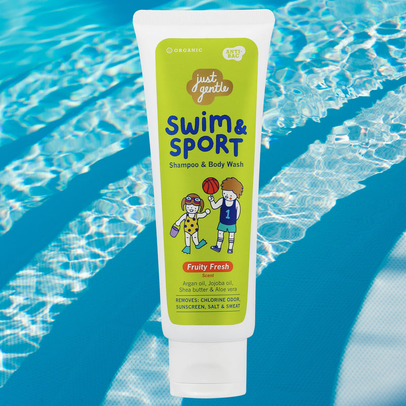 "Swim & Sport shampoo bottle beside pool with text showing it removes chlorine, sunscreen, odor, sweat, and salt."