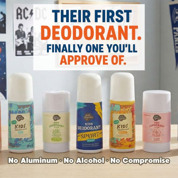 Collection of Just Gentle children's deodorants on a wooden surface with promotional text about ingredients.