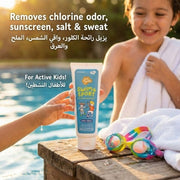 Tube of Just Gentle swim and sport product with child by poolside
