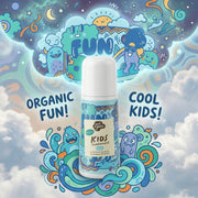 A playful advertisement for Just Gentle Kids Deodorant. The deodorant bottle sits in the center, surrounded by cute, cartoon monsters playing in blue waves. The background features a dreamy sky with clouds and stars, accompanied by the text "Organic Fun!" and "Cool Kids!".