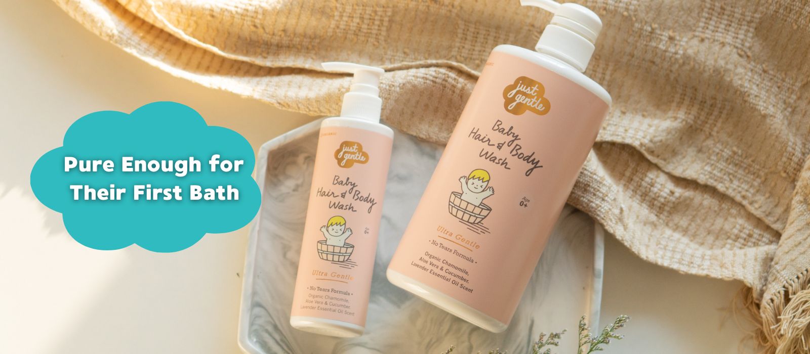 Two bottles of Just Gentle baby wash with a text overlay on a soft background