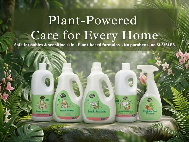 Set of 'Just Gentle' plant-based cleaning products with green labels against a natural background