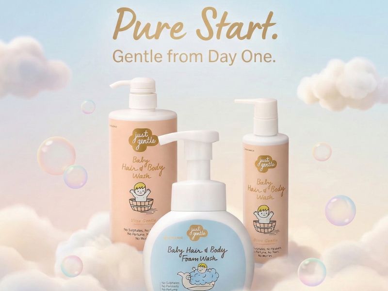 Three bottles of 'Just Gentle' baby products with a soft, cloud-like background and text 'Pure Start. Gentle from Day One.'